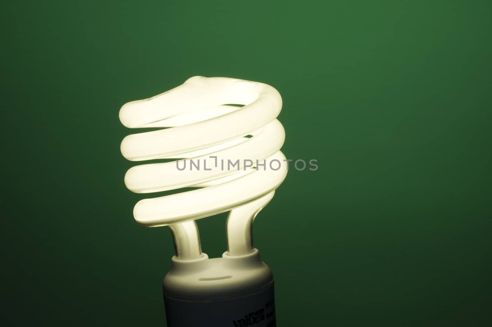 Horizontal image of fluorescent light on green background