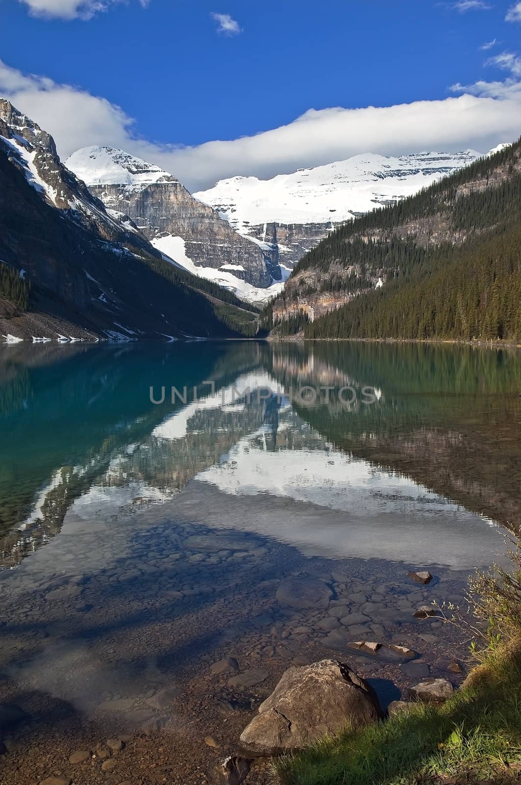 Lake Agnes.reflection in the water of Canadian Mountain