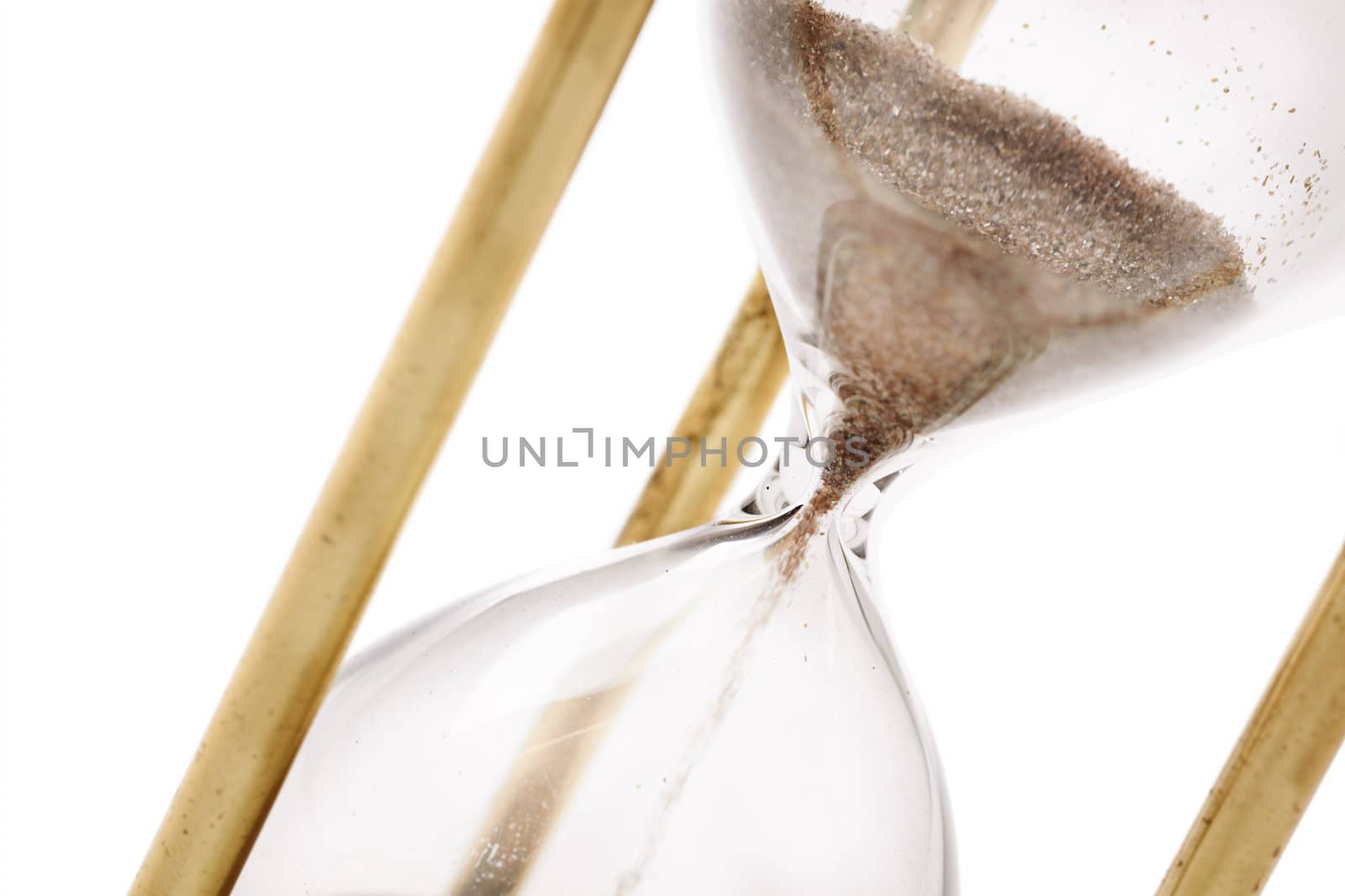 Close up of hourglass isolated on white background, selective focus 