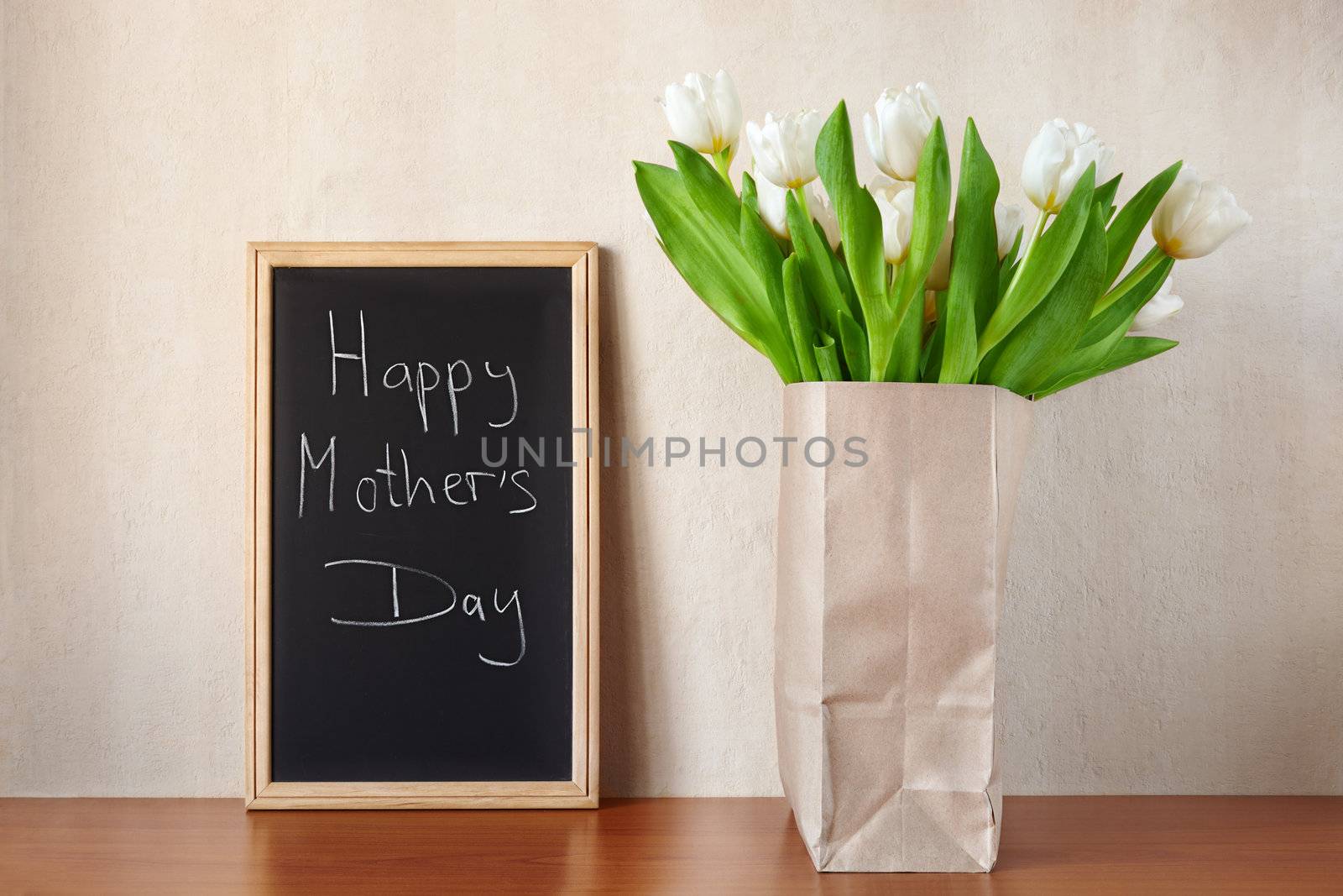 white tulips with Mother's Day greetings, selective focus