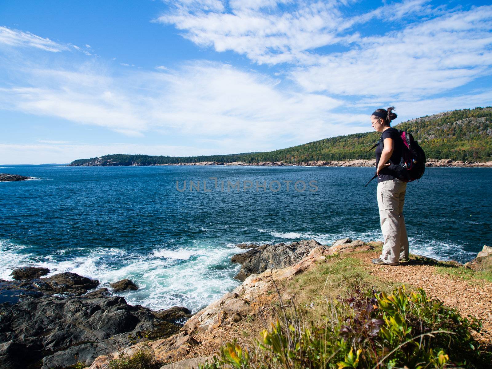 Woman hiking in Acadia National Park