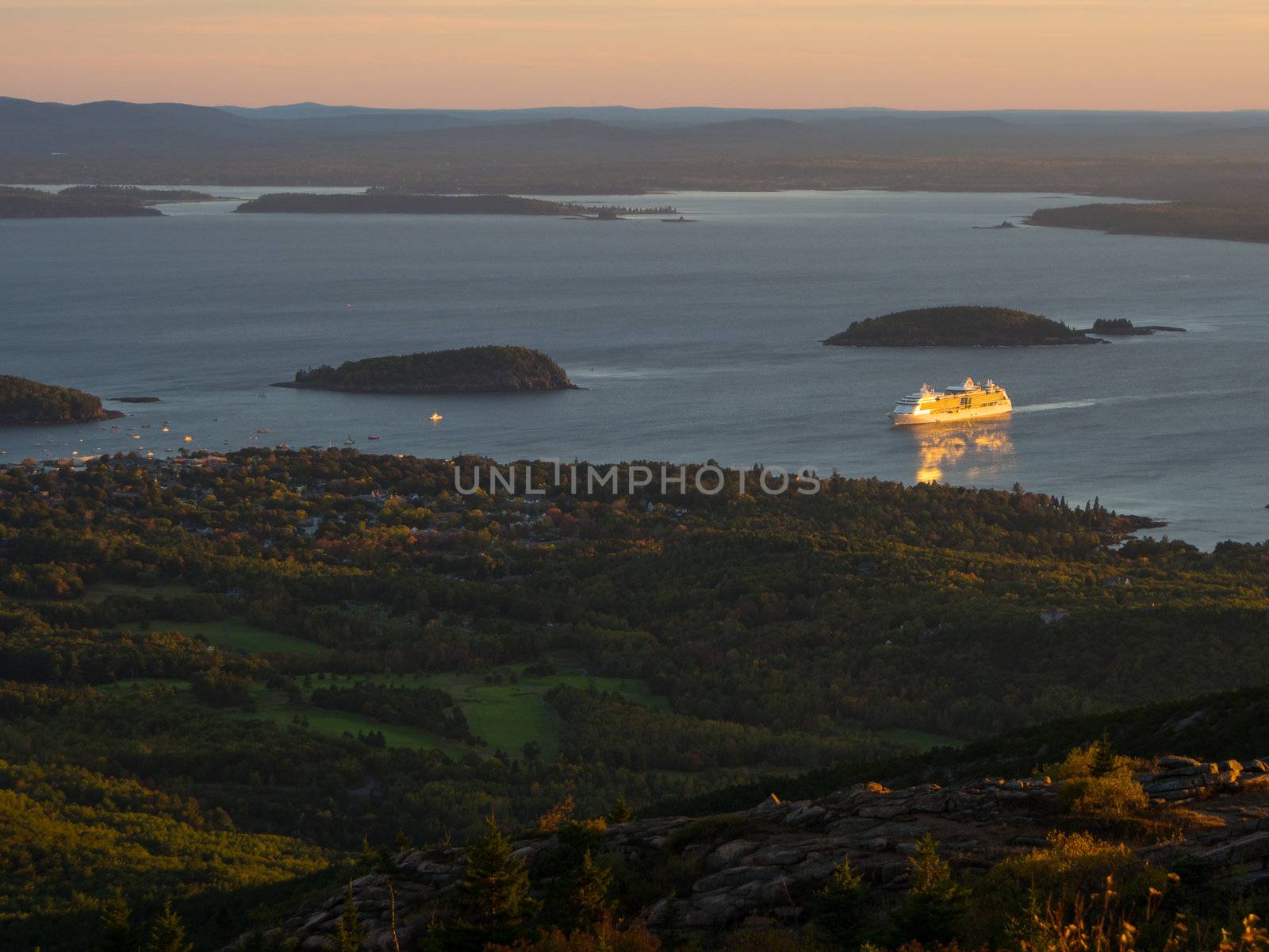 Cruise ship arriving at Bar Harbor at sunrise