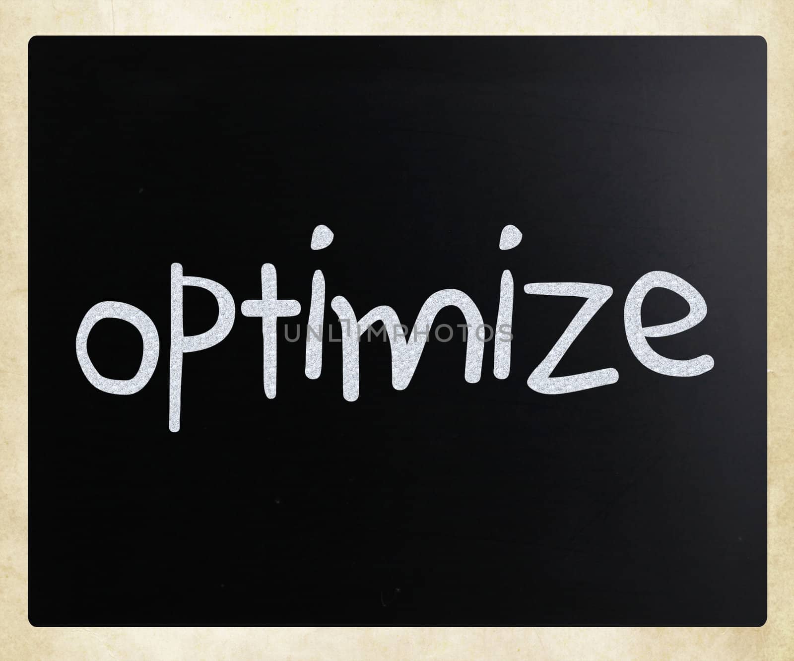"Optimize" handwritten with white chalk on a blackboard