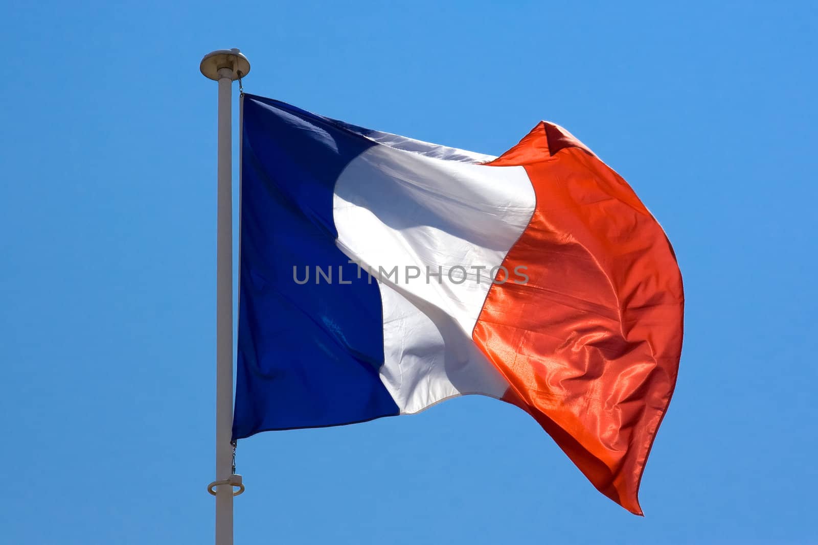 French flag on blue sky