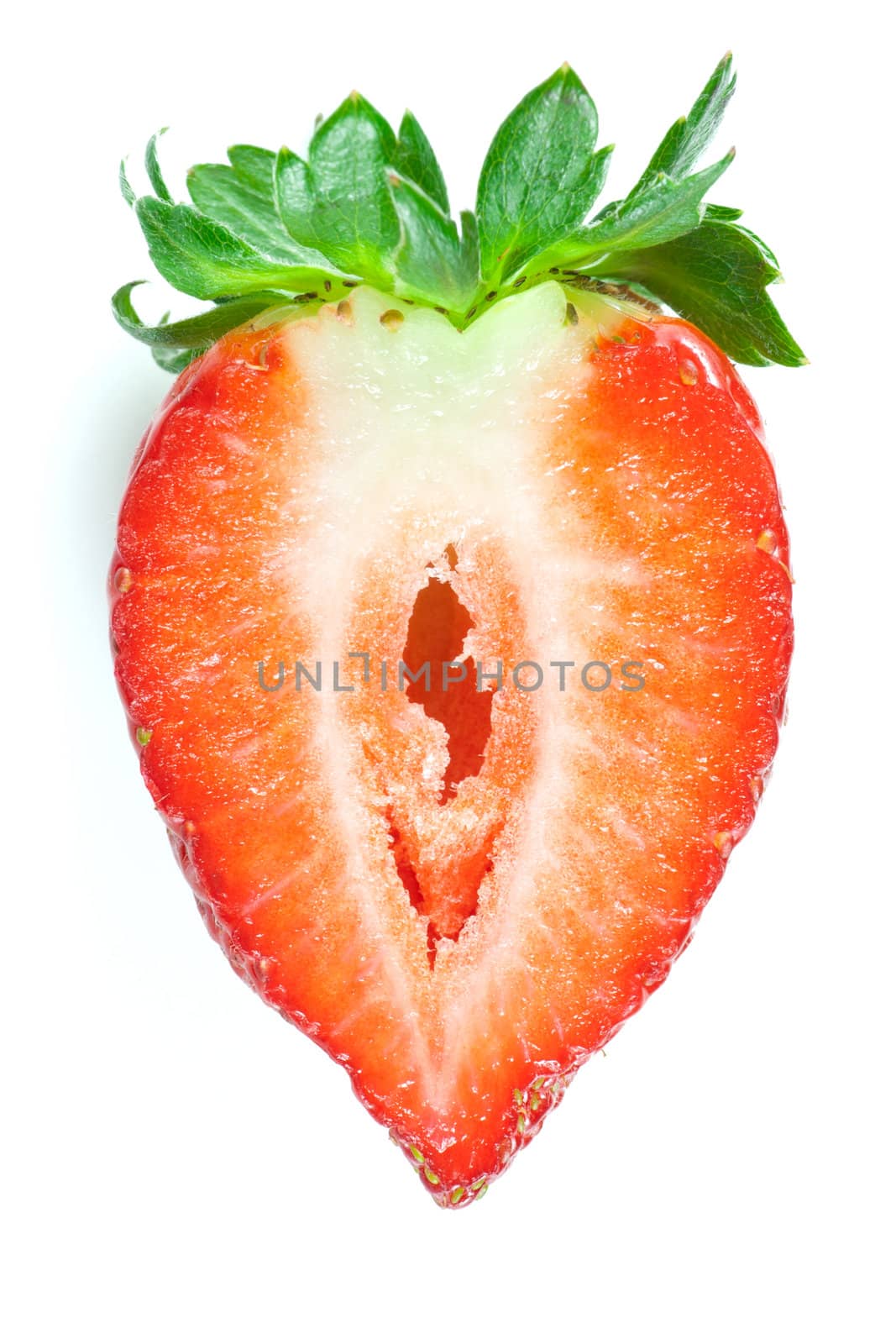 strawberry cut into half heart-shaped and isolated on white background