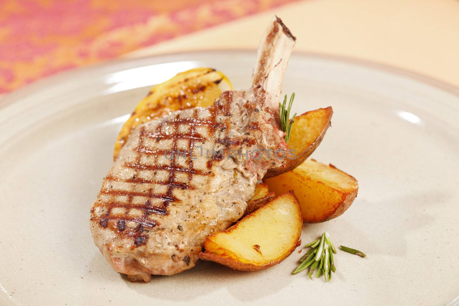Grilled meat ribs with potatoes by shebeko
