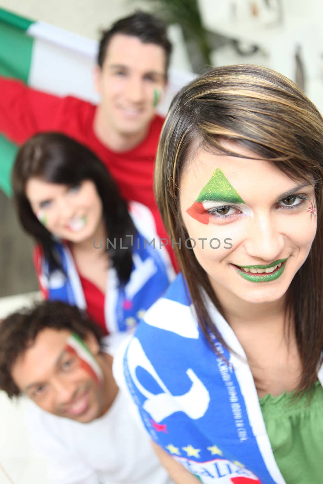 Group of friends supporting the Italian football team