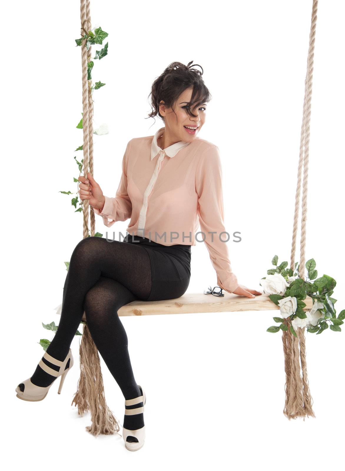 A woman is sitting on a swing by raduga21