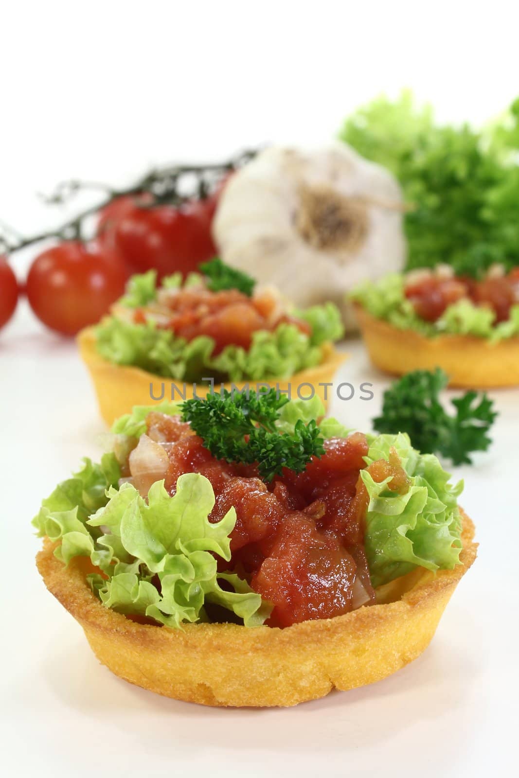 corn basket with tomatoes, garlic, onion and chili