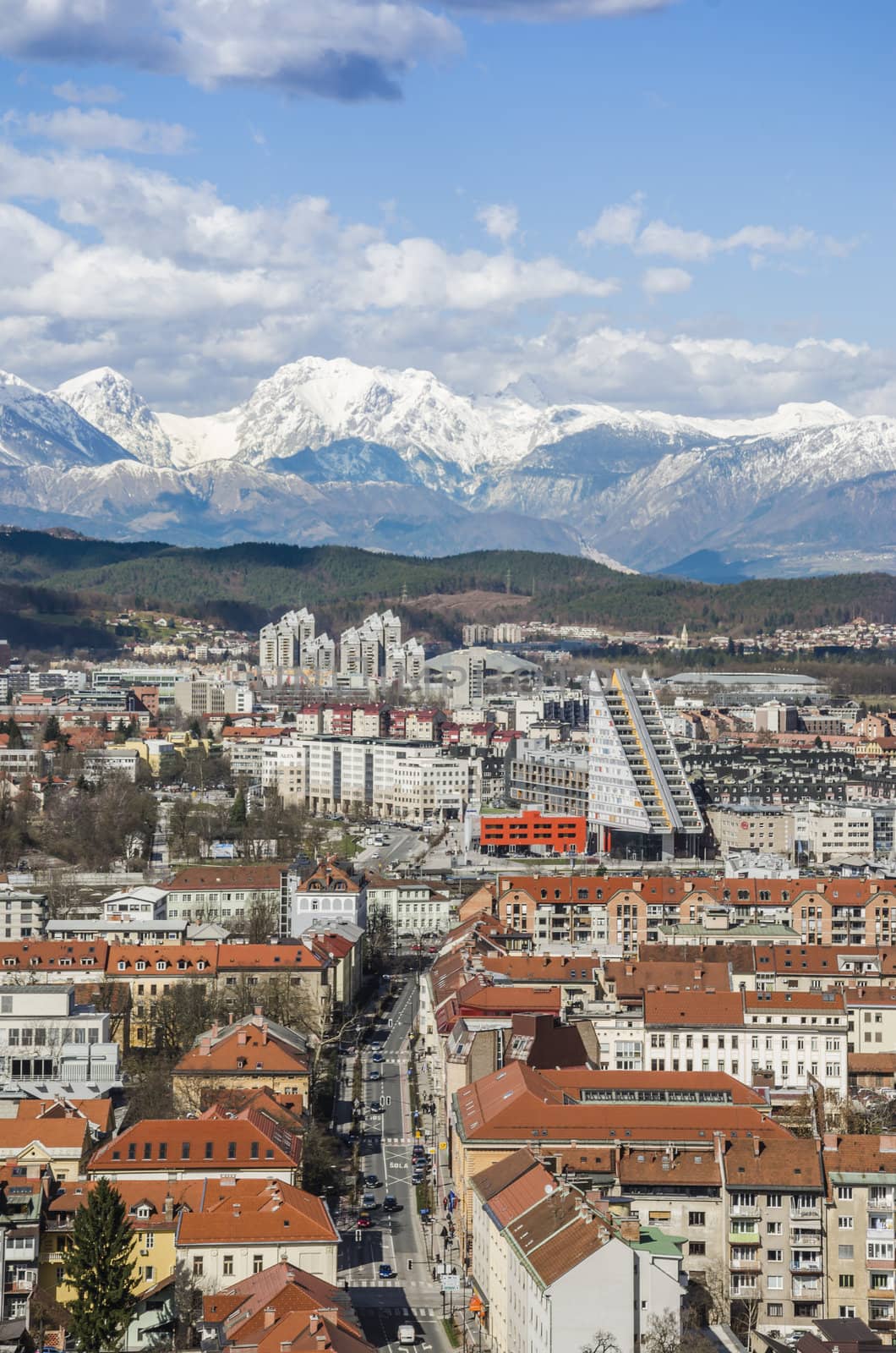 Aerial view on Ljubljana with mountains in background.