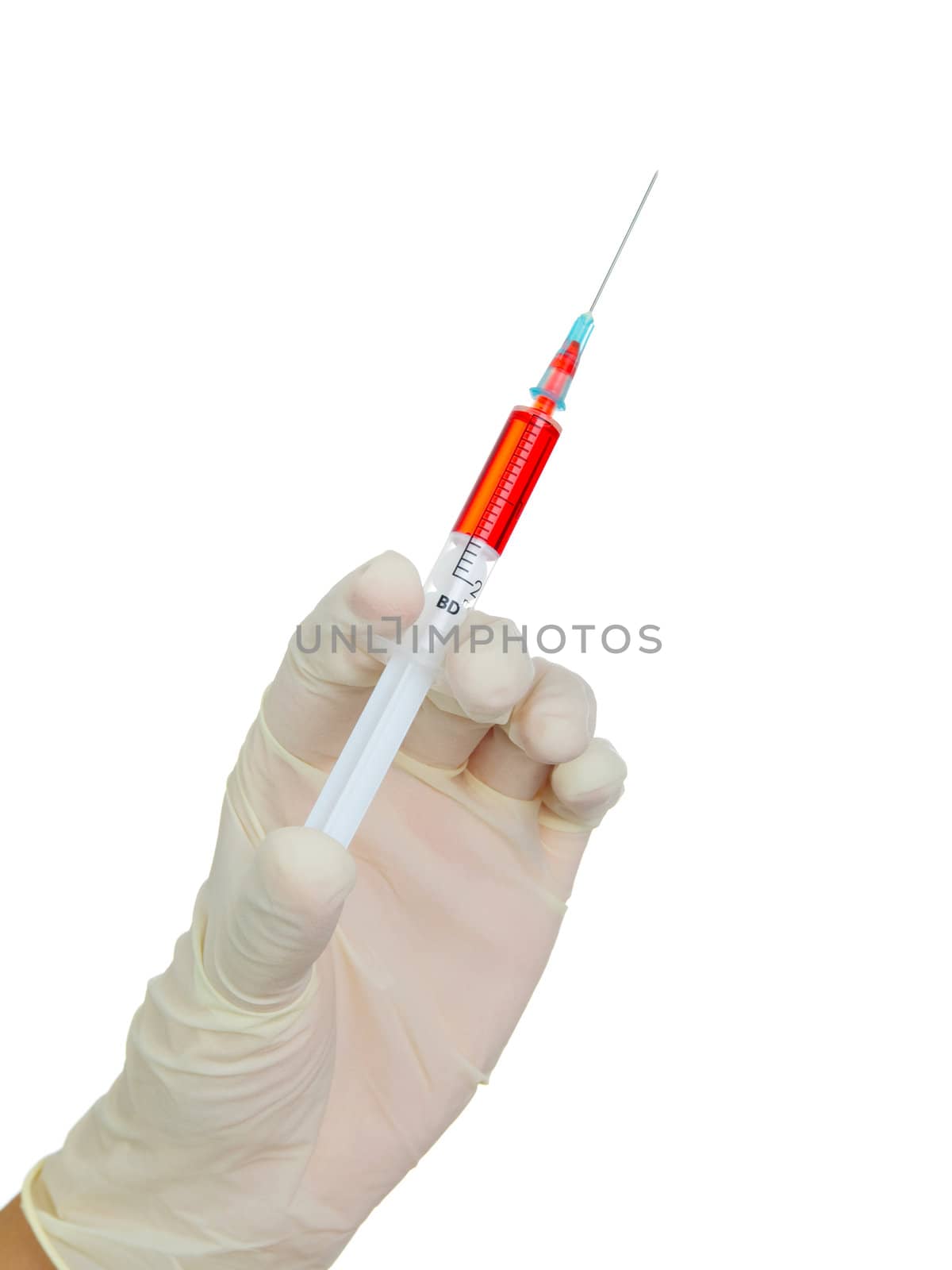 hand holding syringe before making injection  