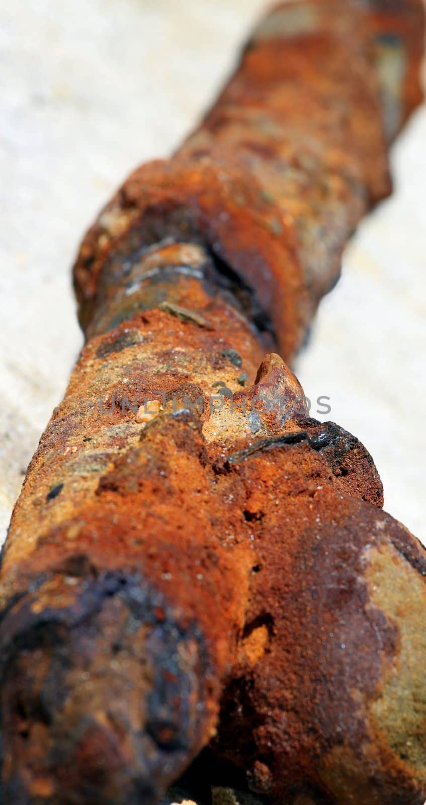 Close up of a rust old metal pipe.