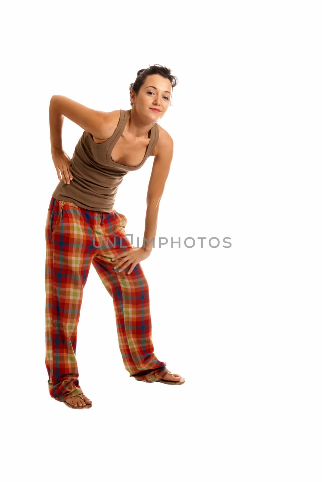 Young beautiful woman with pajamas isolated on white background