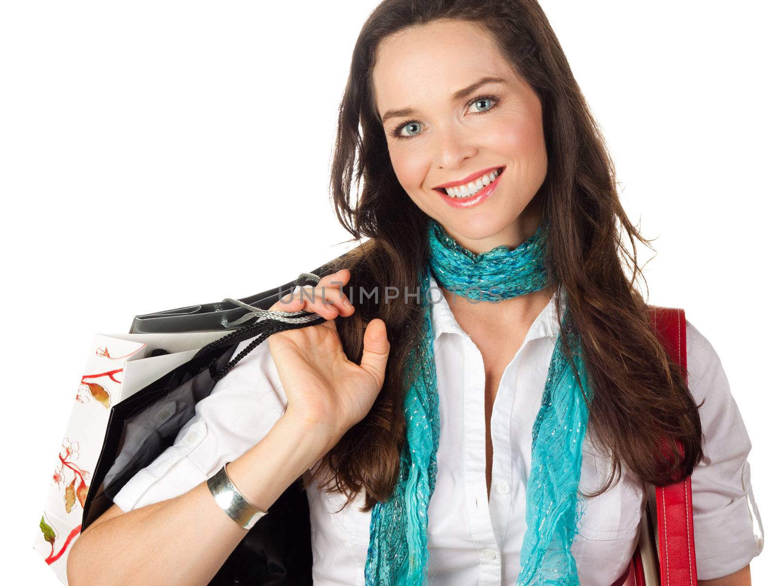 A close-up portrait of a beautiful young woman shopping. Isolated on white.