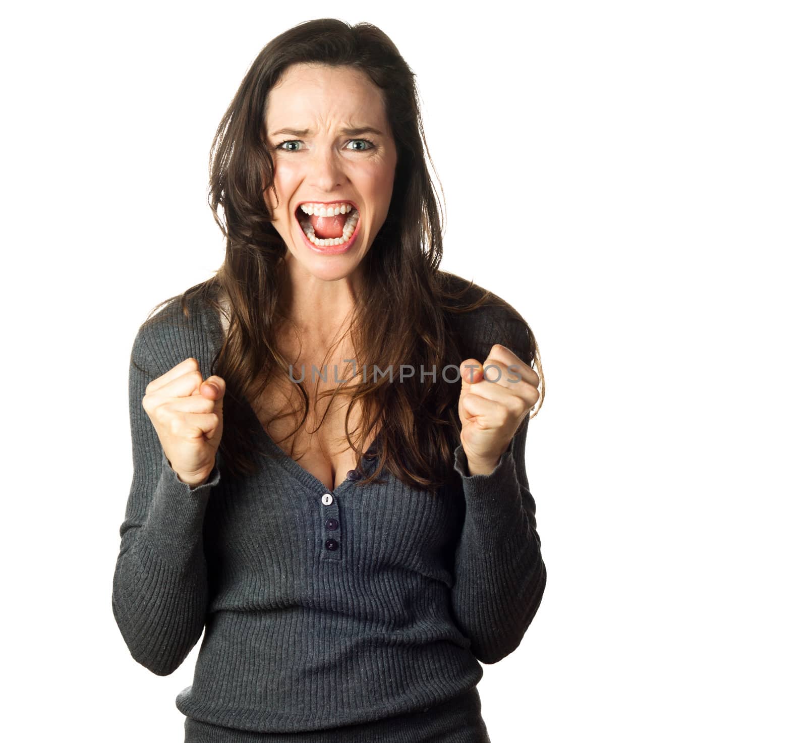Isolated portrait of a very angry, frustrated and upset young woman.