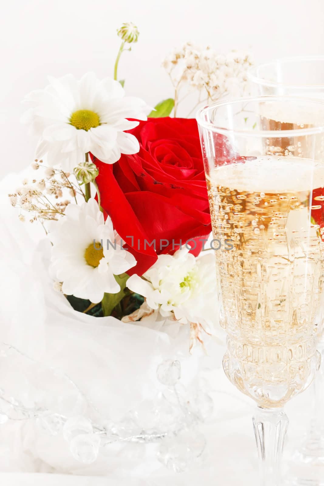 champagne with wedding flowers
