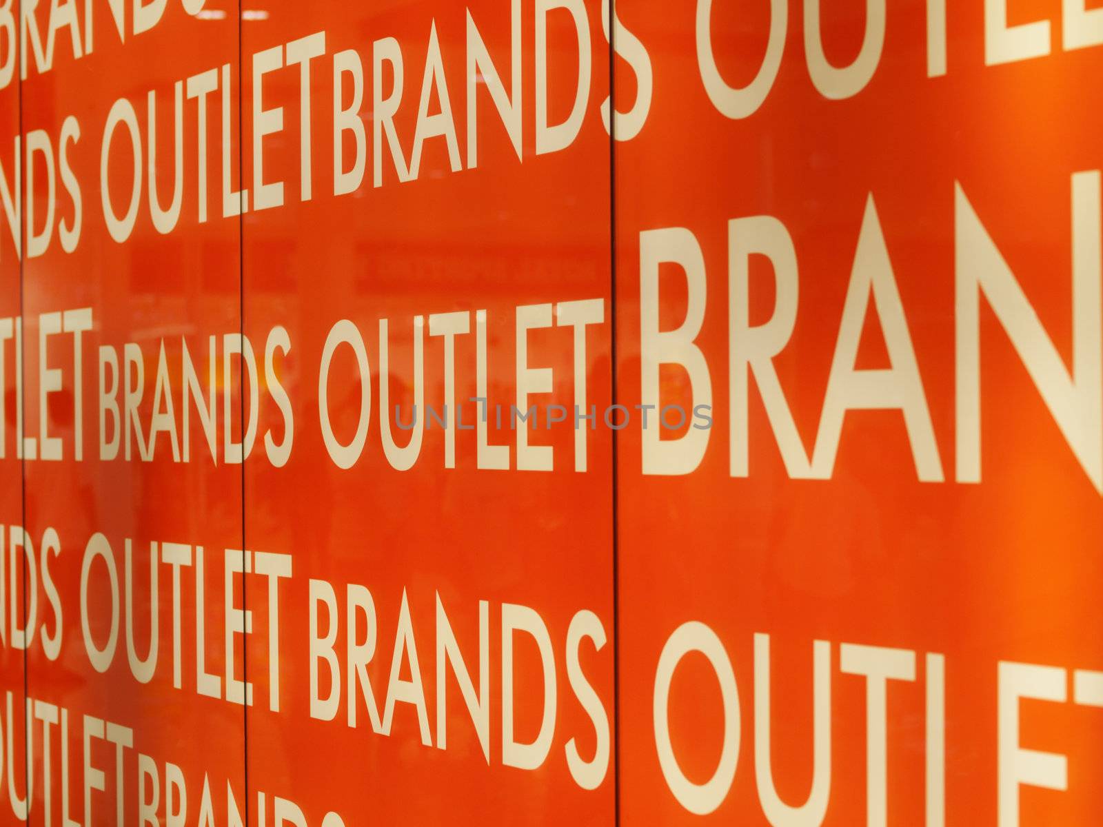 Orange glass panel outlet brand in a mall