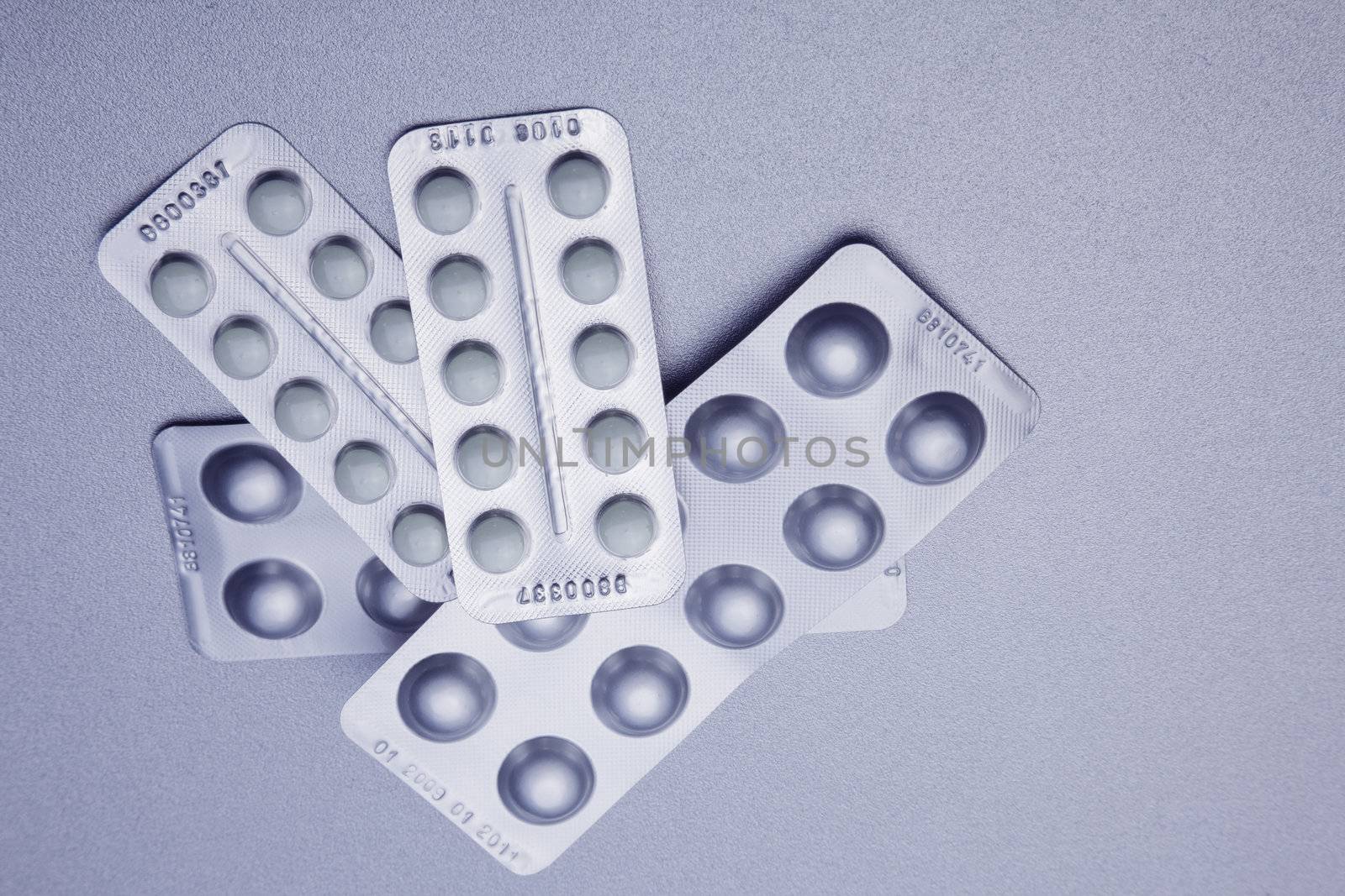 Silver Pills On Metal Table Background, copy space