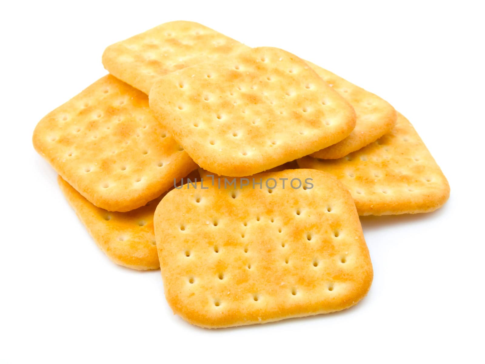 Stack of crackers isolated on a white background  by motorolka