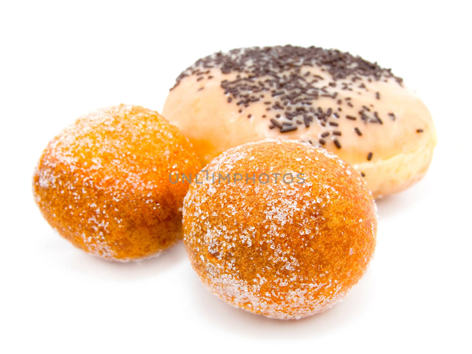 Fried doughnuts on a white background  by motorolka