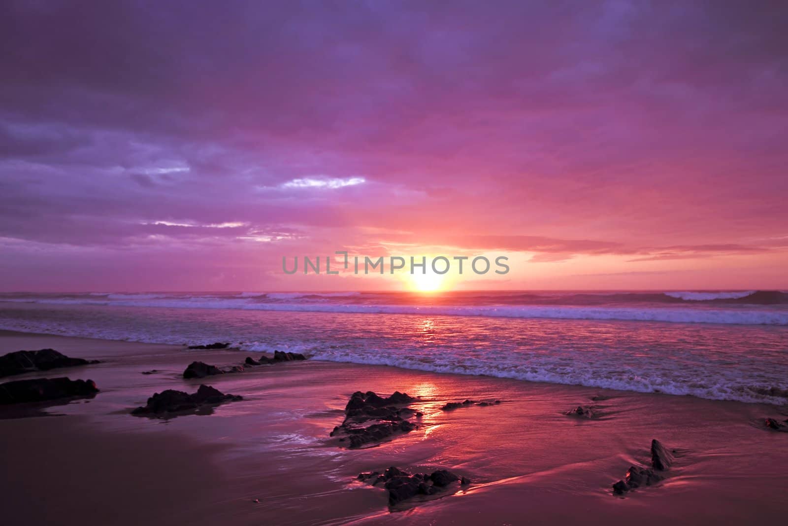 Purple sunset at the atlantic ocean in Portugal