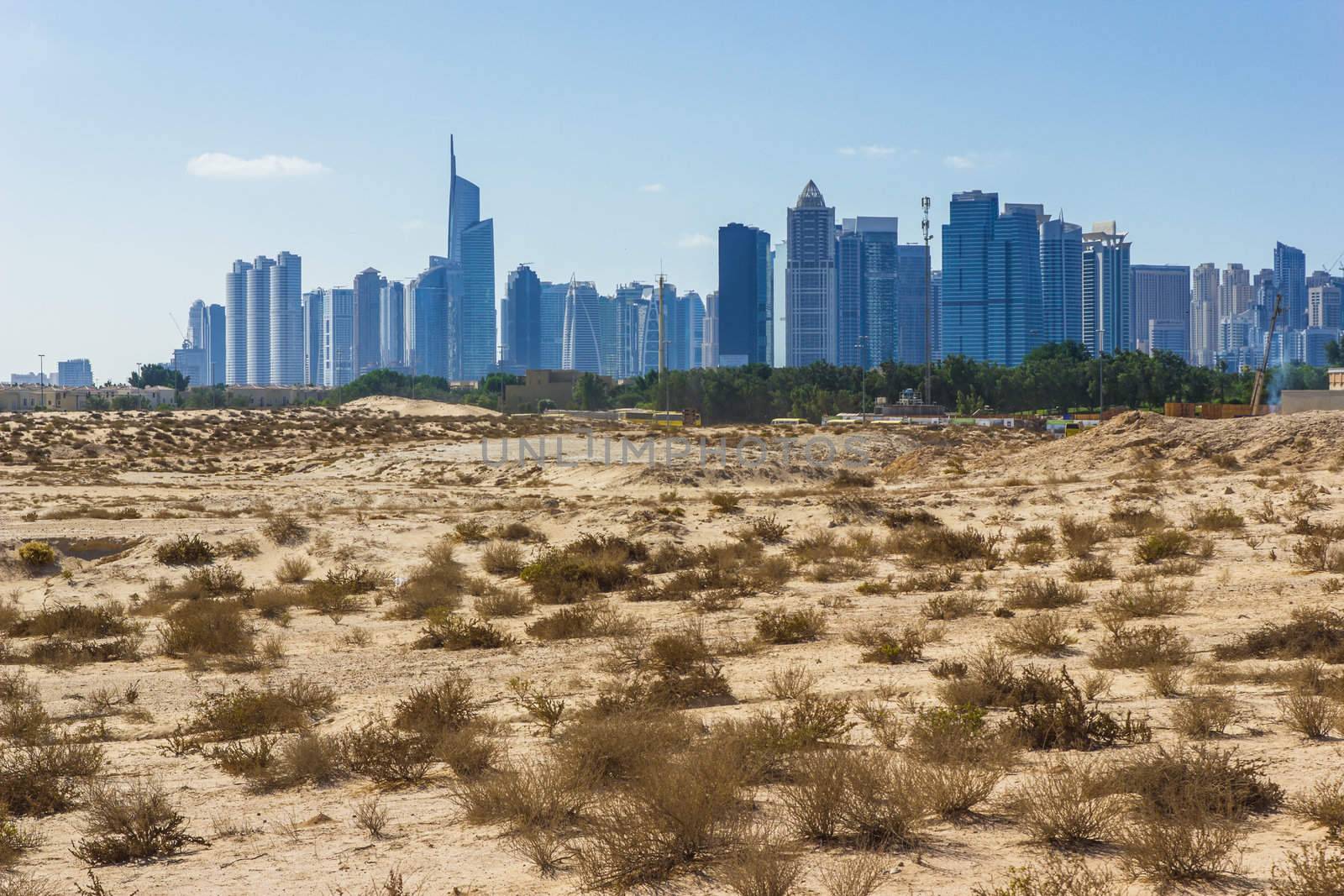  Midday heat in the desert in the background buildingsl on Nov 17, 2012 in Dubai UAE