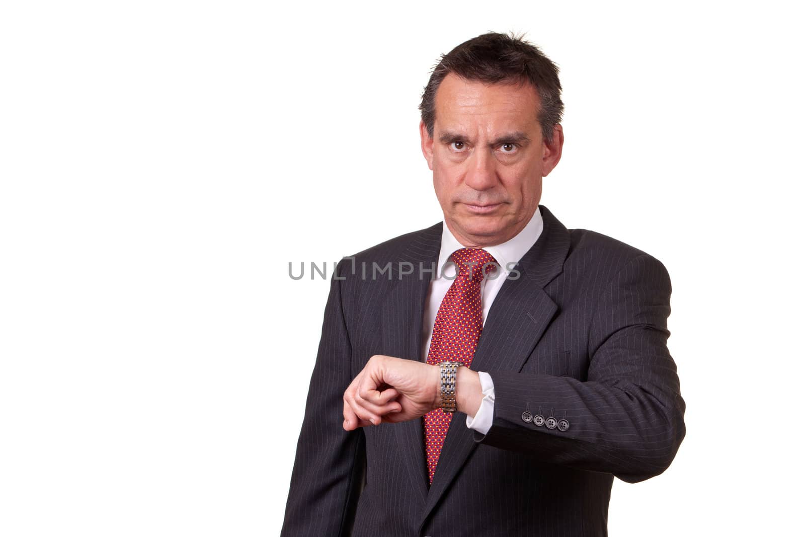 Frowning Angry Middle Age Business Man in Suit Looking at Time on Watch Isolated