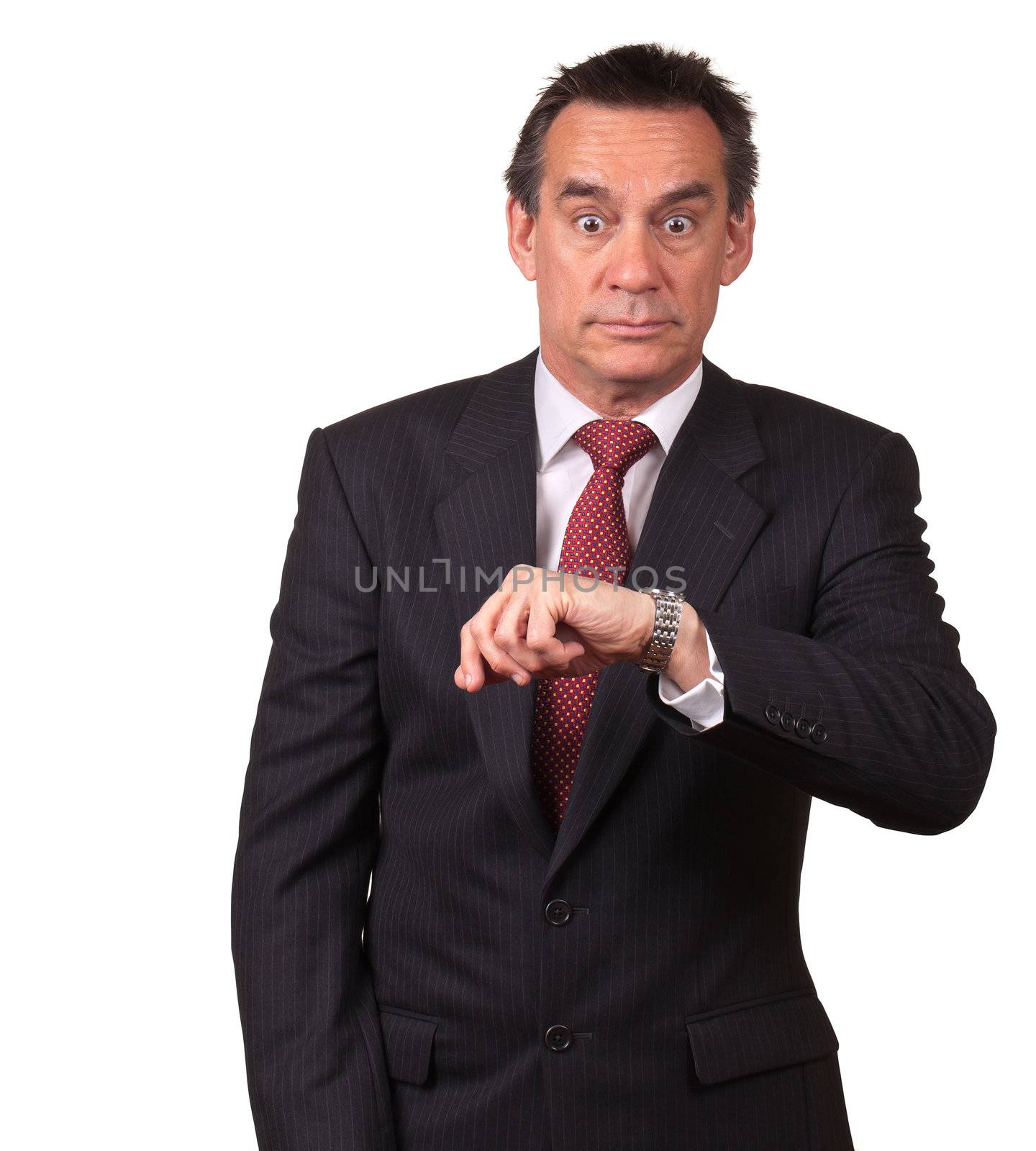 Attractive Middle Age Business Man in Suit Surprised at Time on Watch Isolated