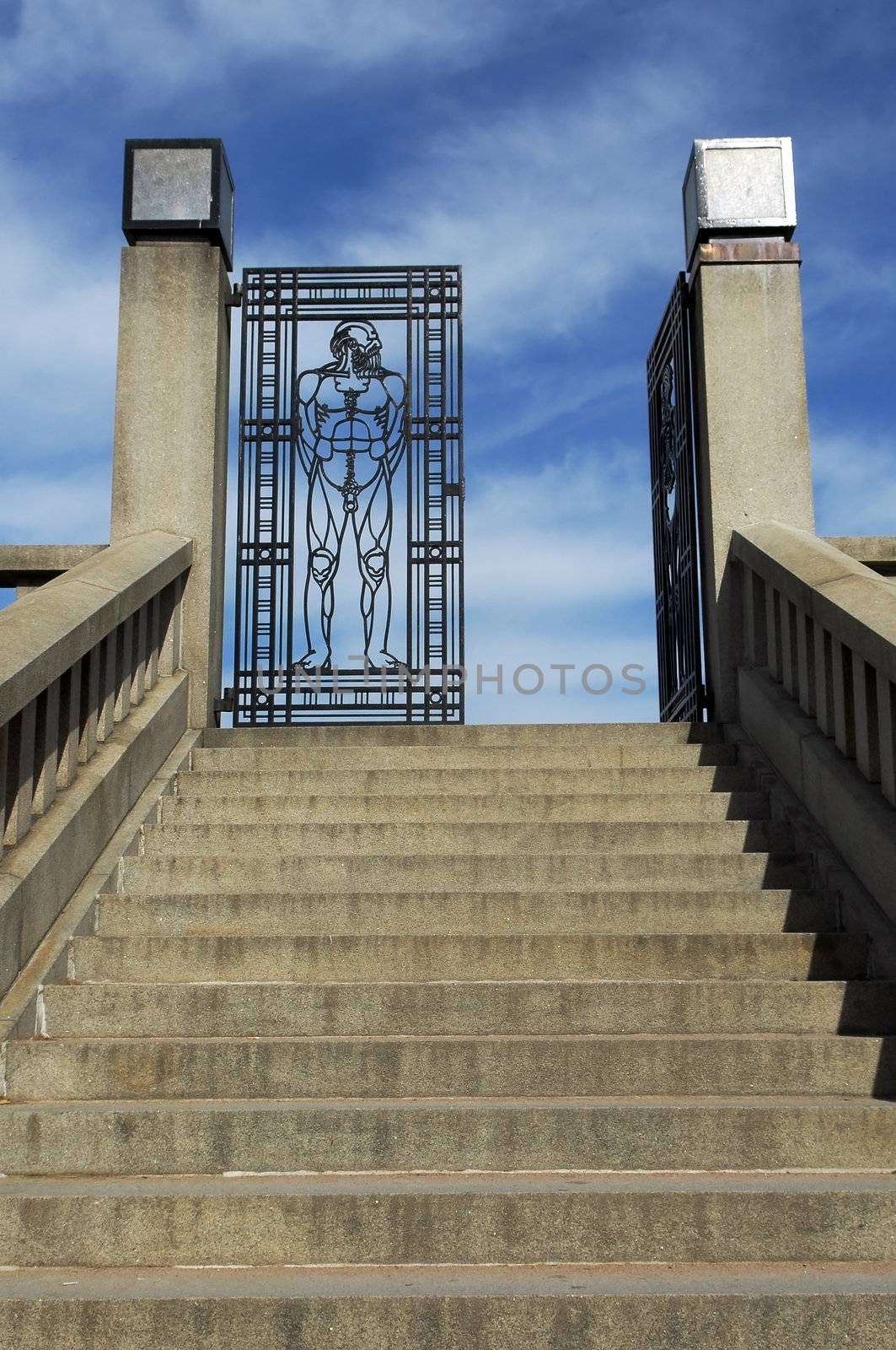 entrance an iron gate to Vigeland park , depict a naked man, Oslo, Norway