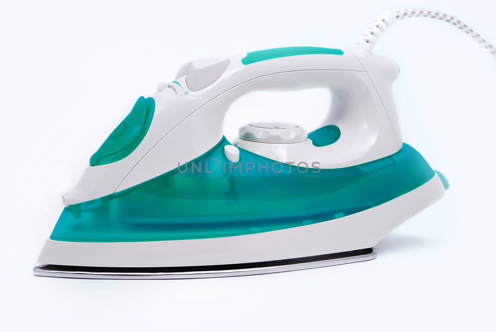 Modern electric iron isolated on the white background