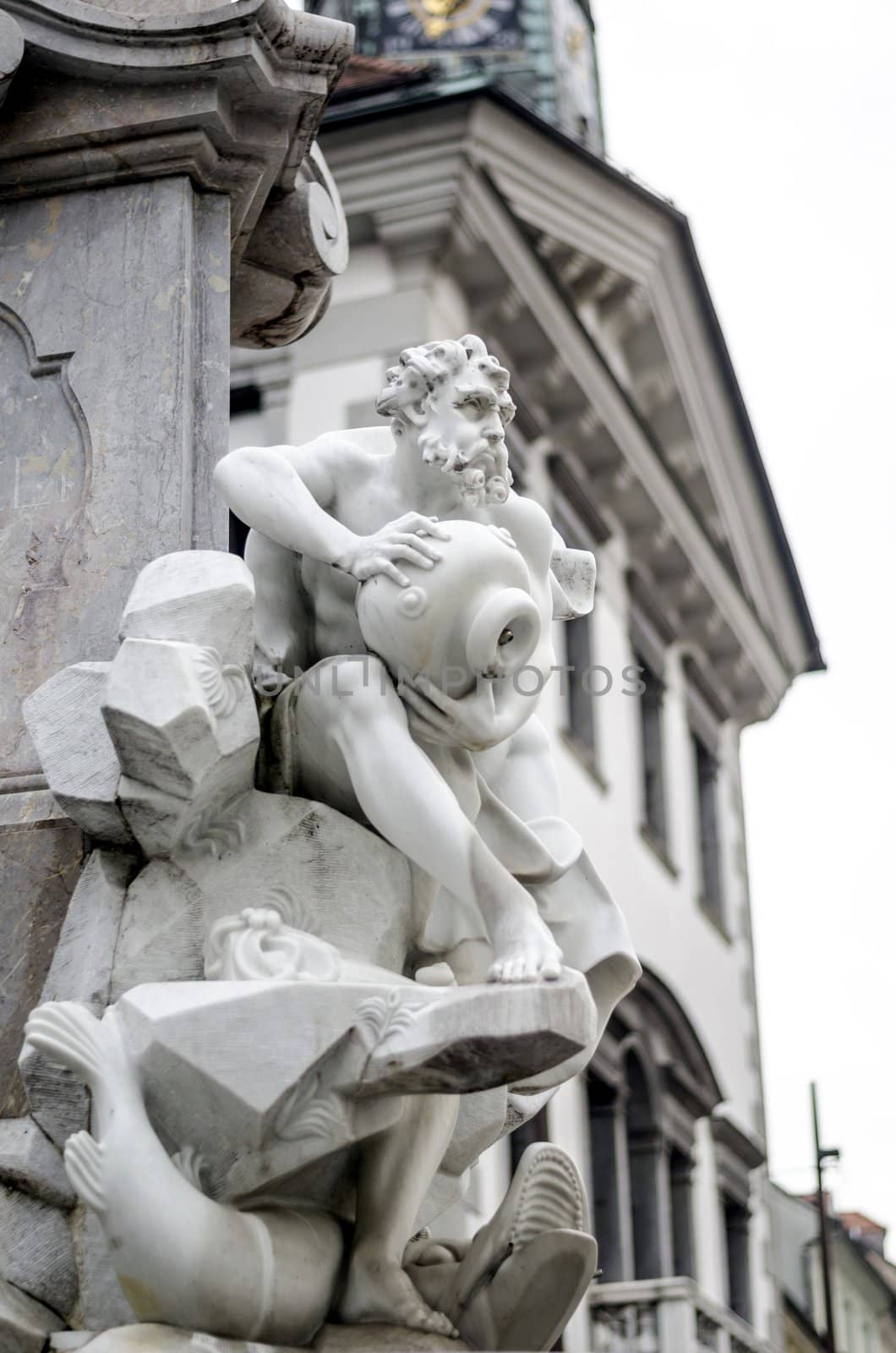 Detail of Robba fountain sculptures with townhall in background.