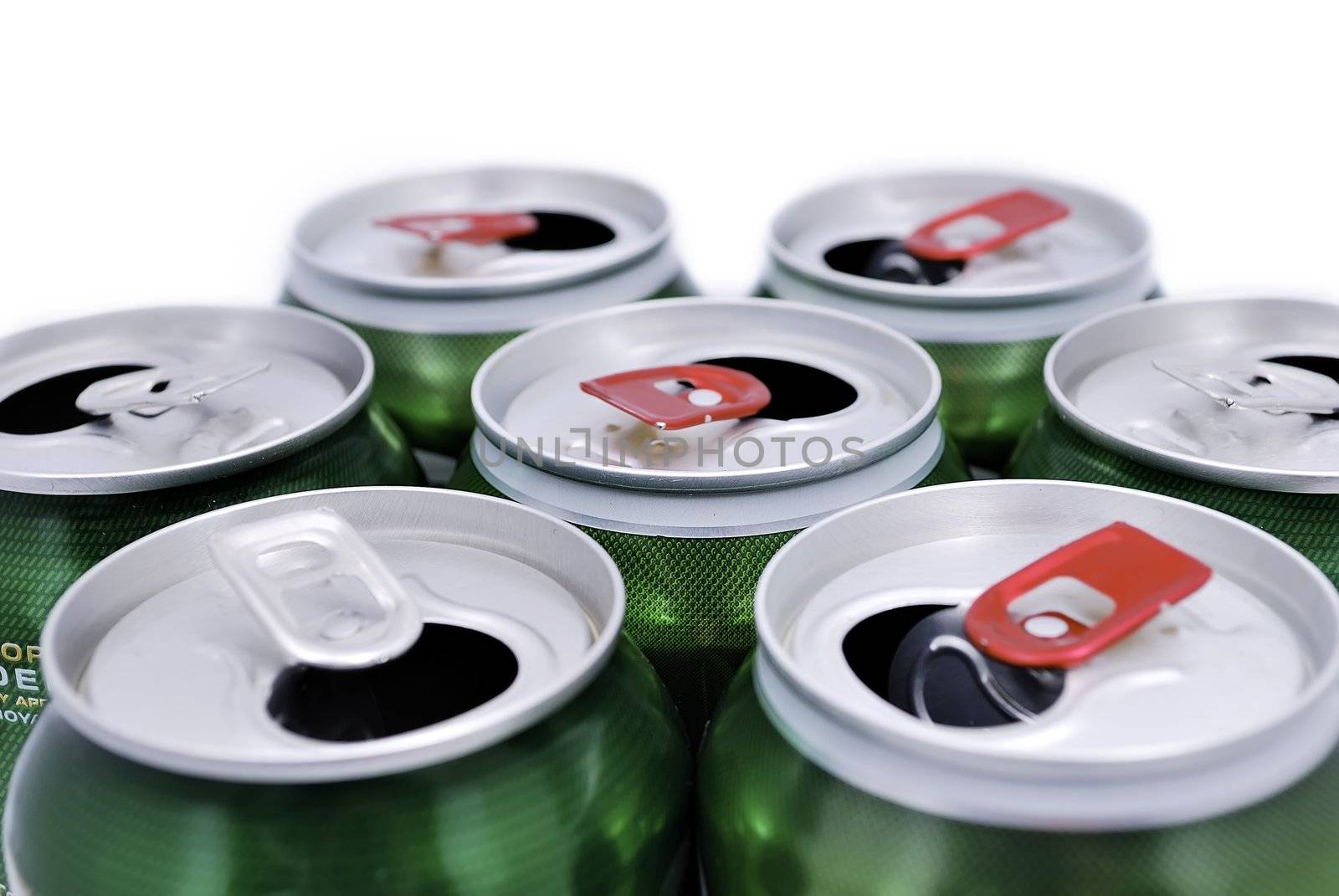 seven open beer cans on a white background