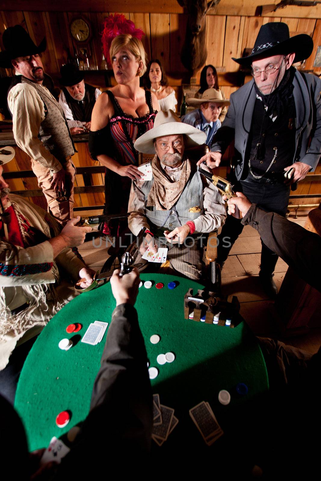 An old western cowboy is caught cheating at cards by the entire saloon.