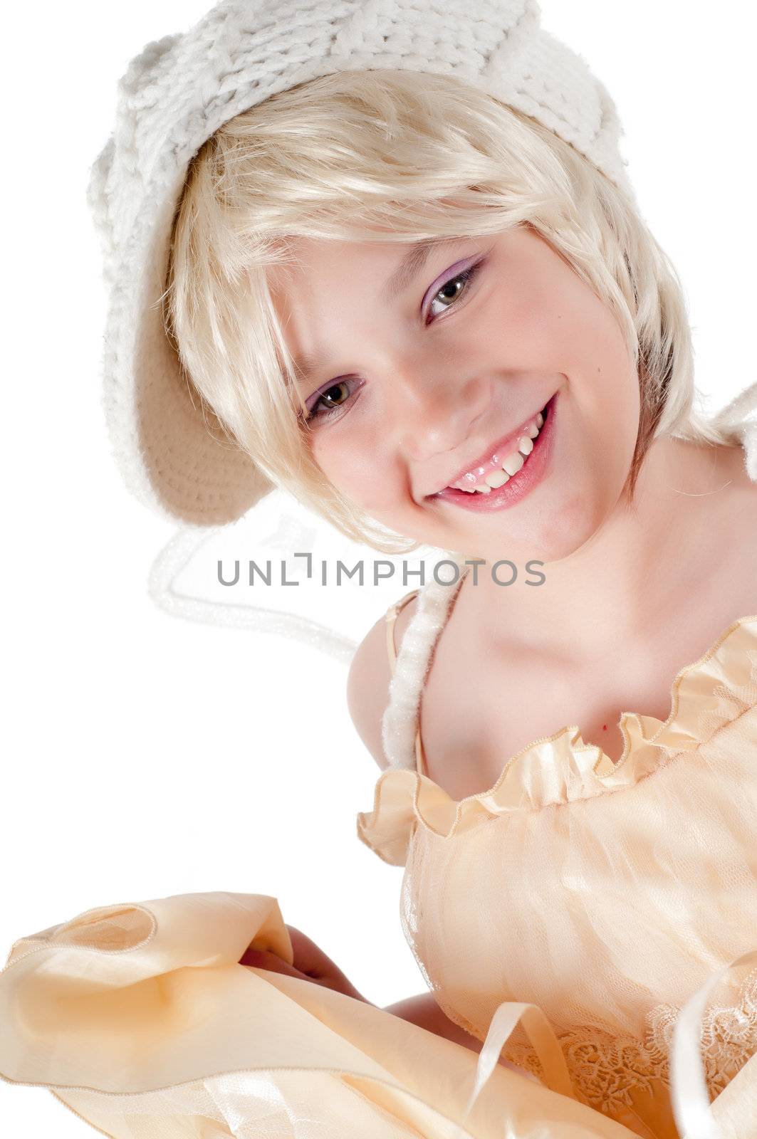 Teenager girl in hat in studio isolated on white