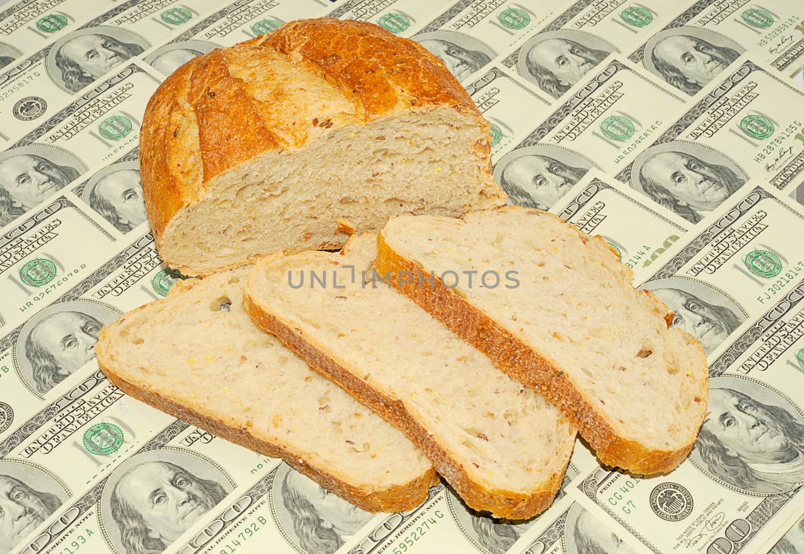 Bread Chunks On The One Hundred Dollar Bills Background.