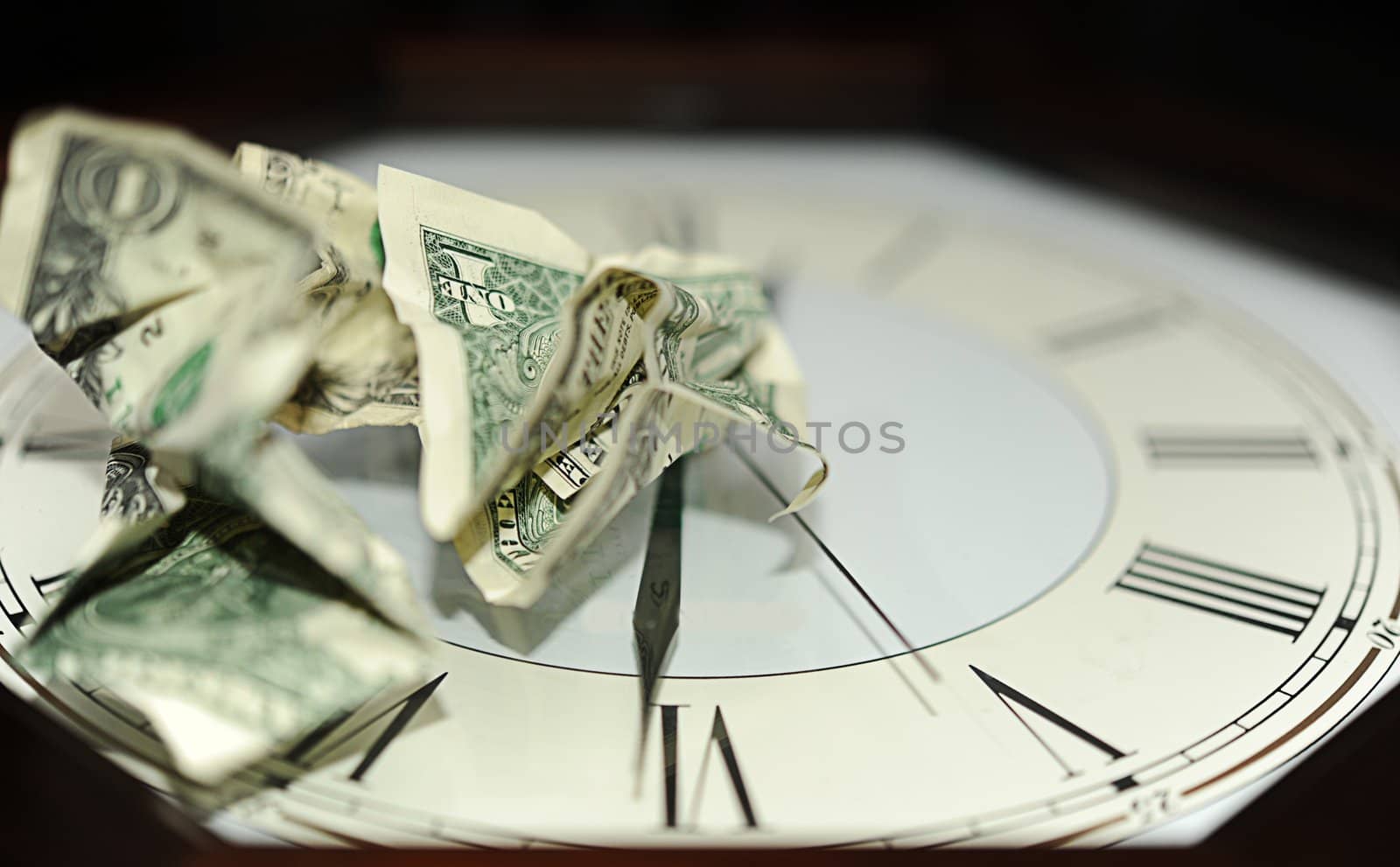 Crumpled One Dollar Bills On The Dial Plate.
