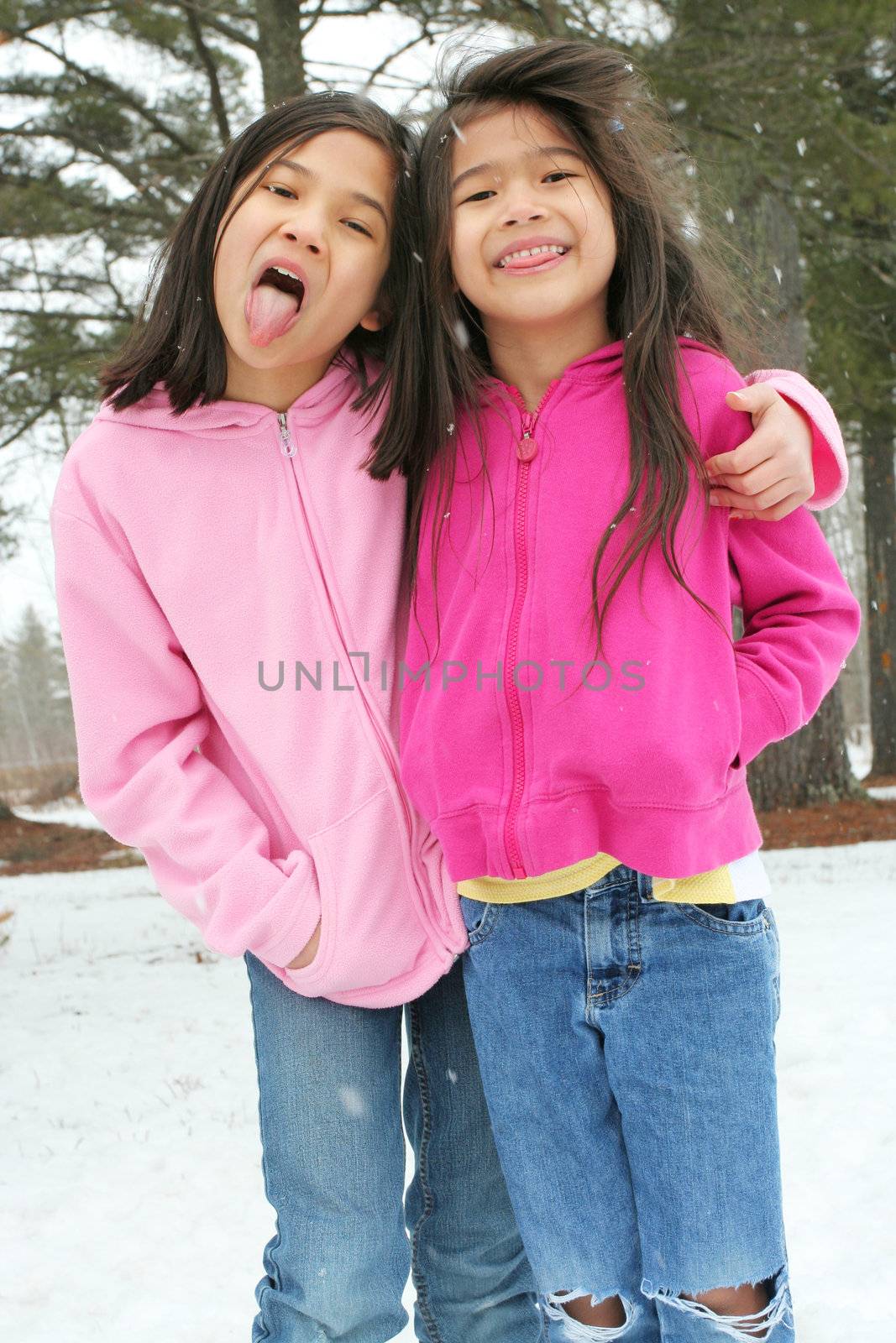 Two sisters enjoying the utdoors in winter