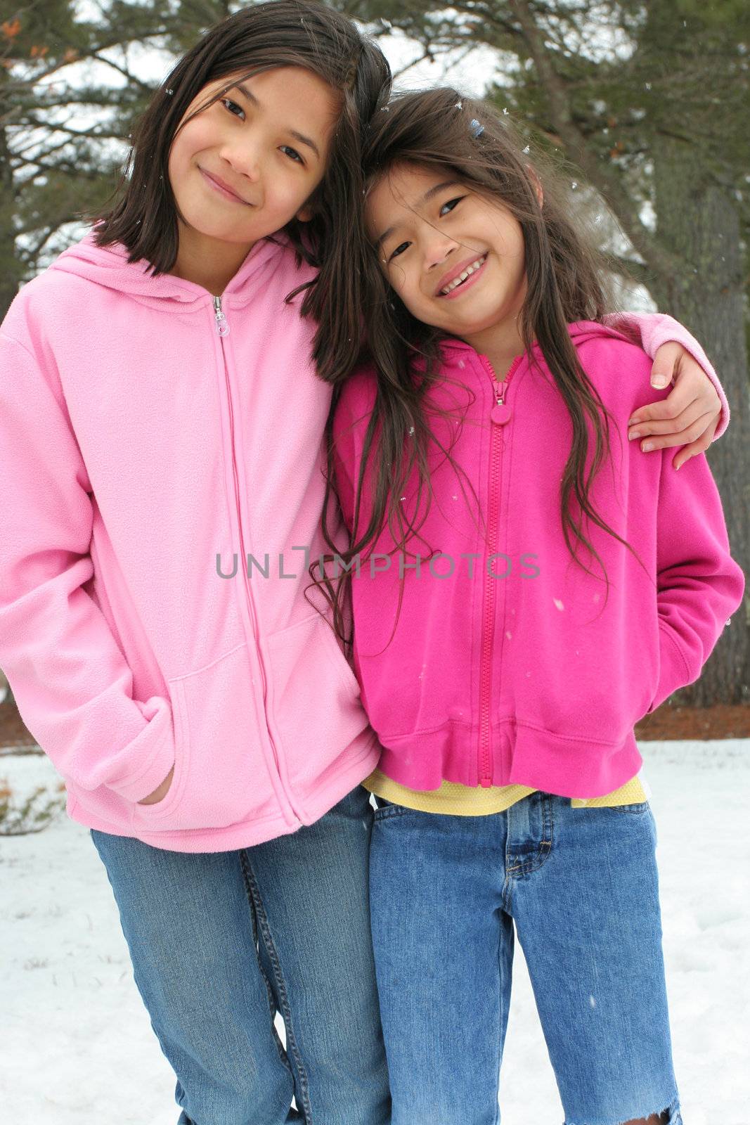 Two sisters enjoying the utdoors in winter