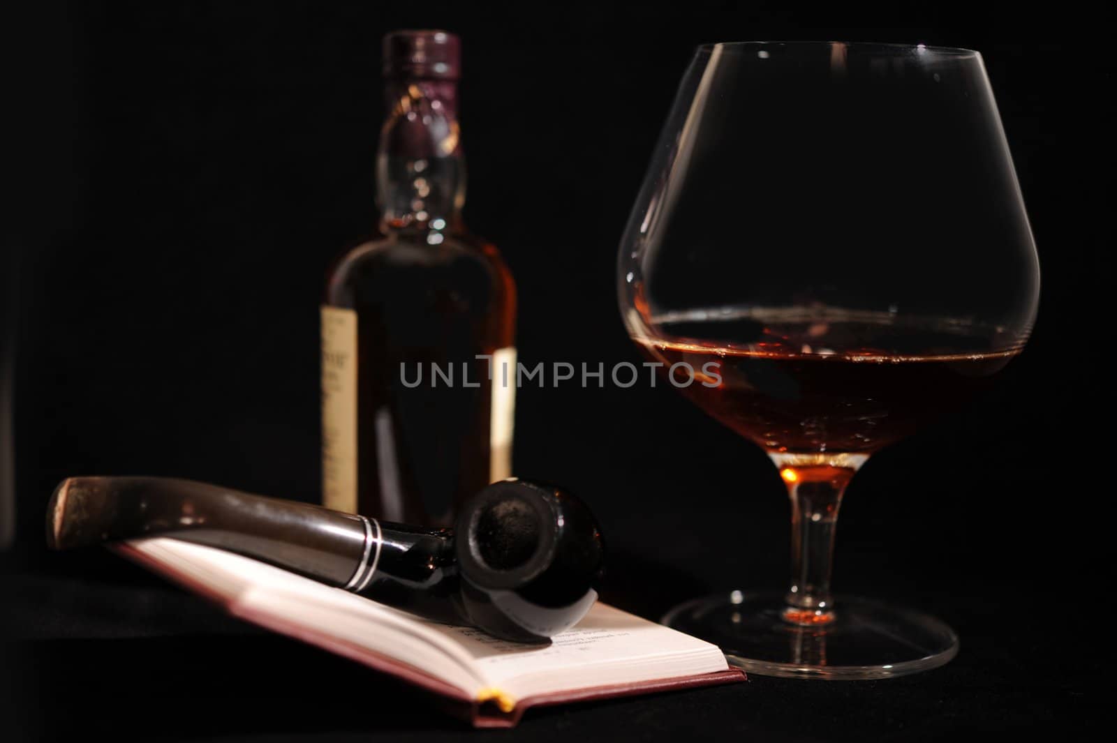 Still Life With Bottle, Pipe, Glass And Open Book.