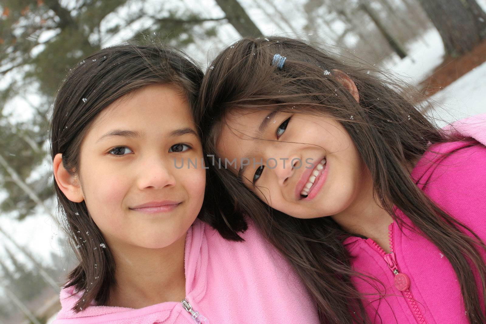 Two sisters enjoying the utdoors in winter