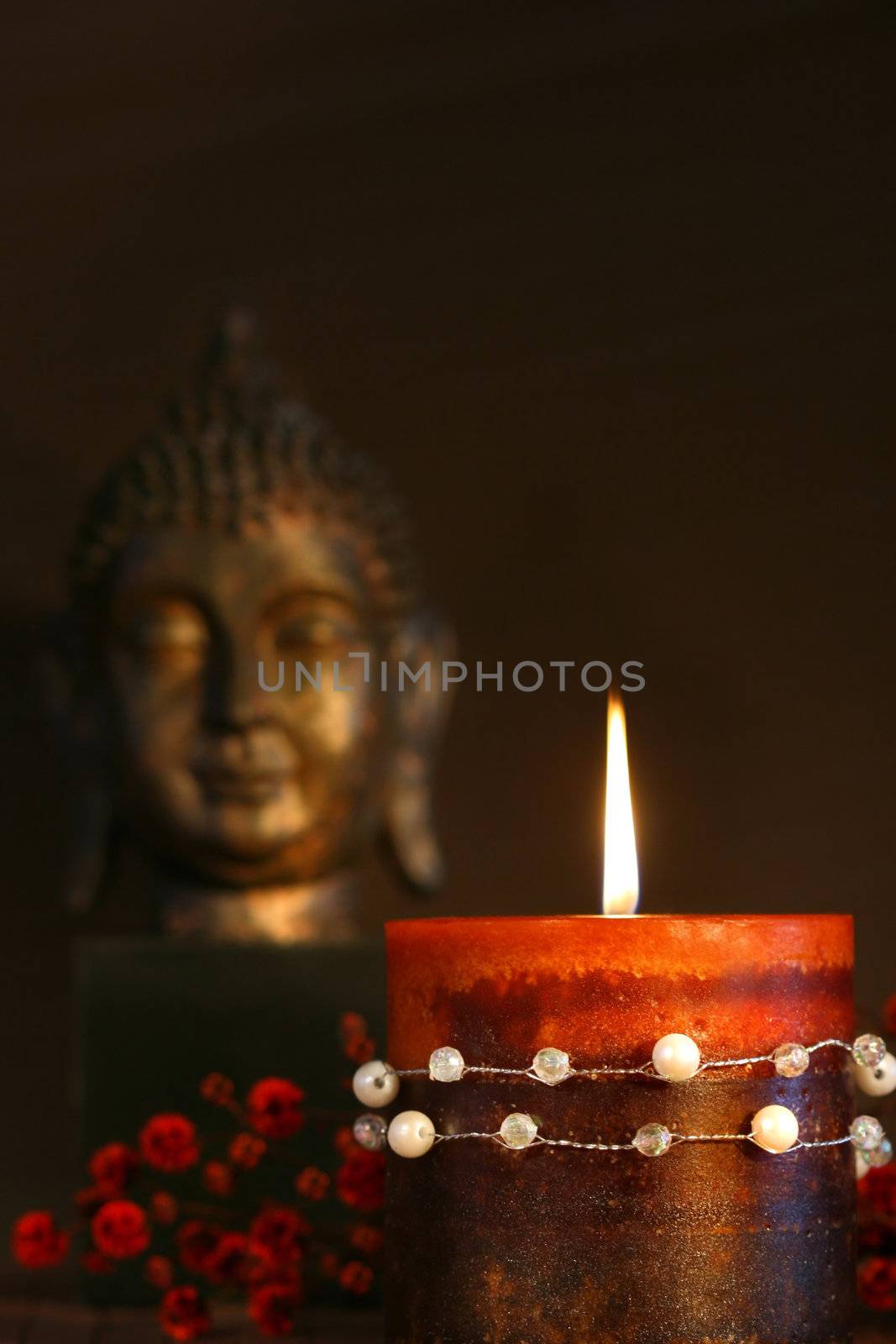 Zen candle and buddha statue by Sandralise