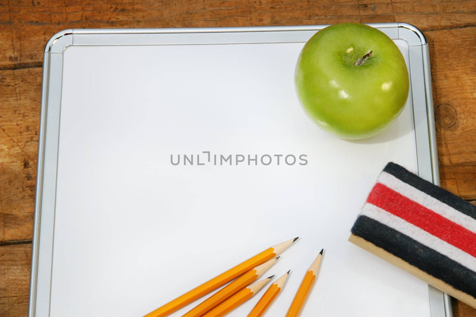 Small memo board for school with green apple