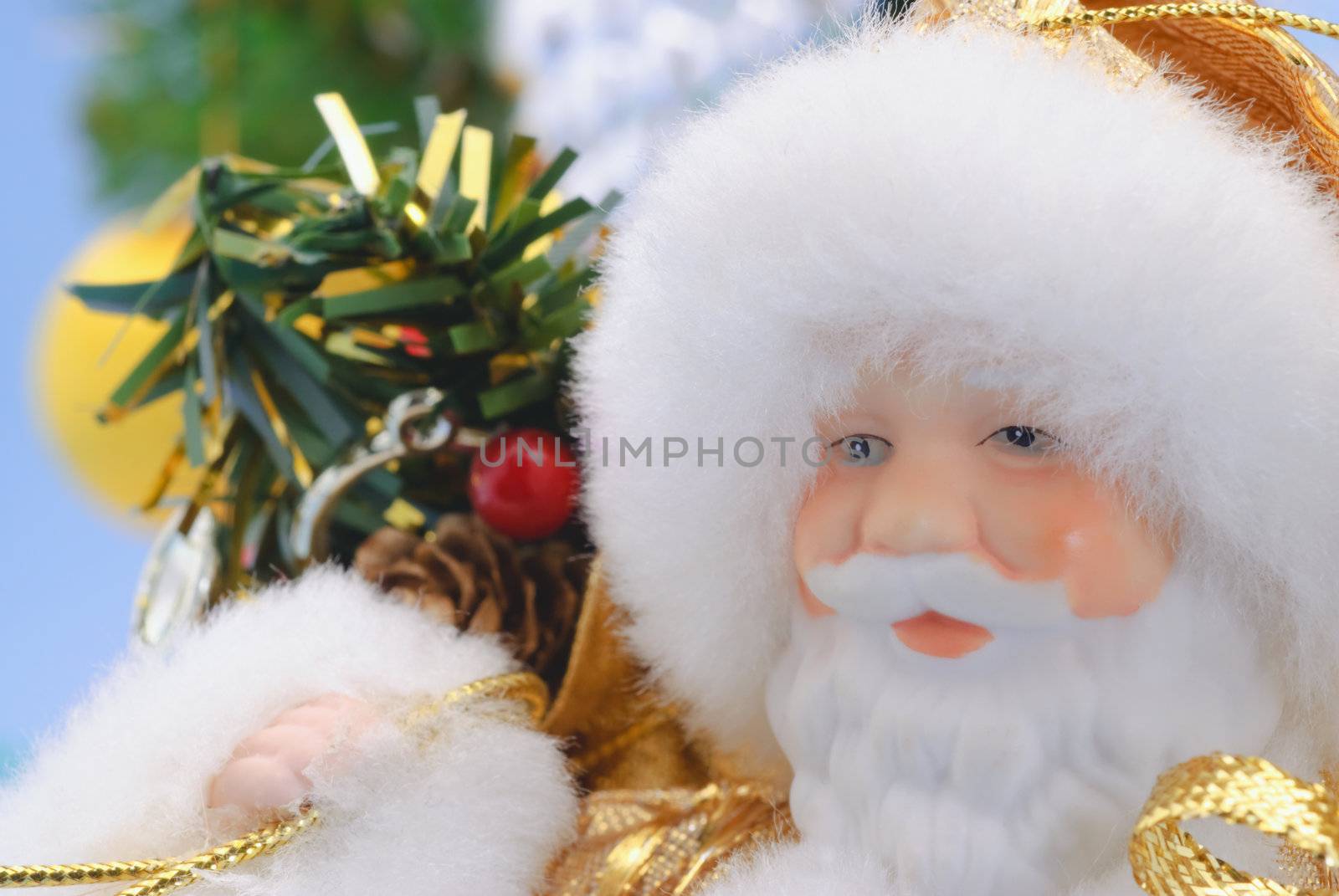 Santa Claus against a backdrop of green spruce with gifts