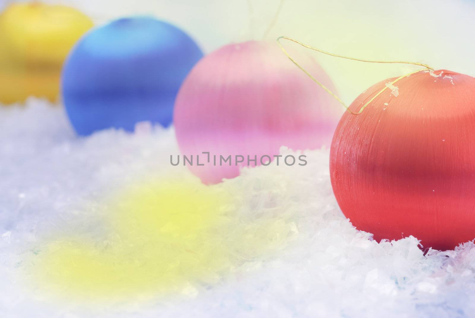 Christmas Baubles against sparkling background