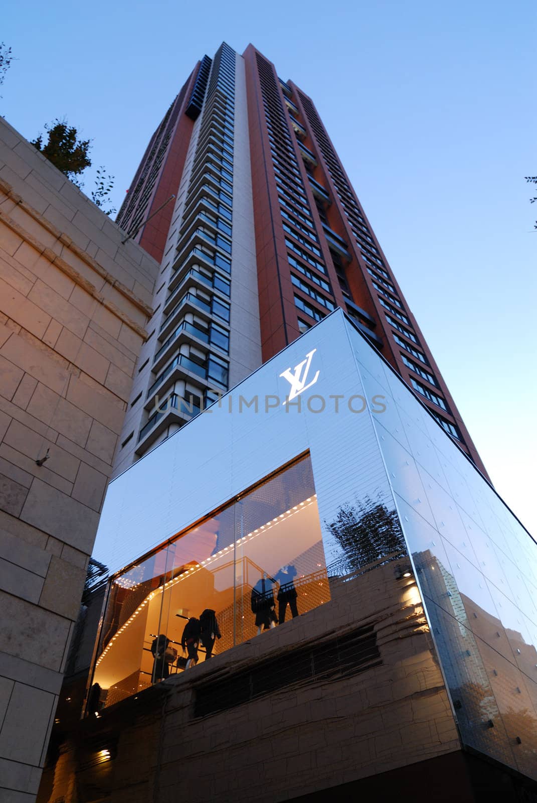 very popular in Japan brand "LouisVutton" shop in  modern architectural environment at  Roppongi Hills, one of the famous Tokyo landmarks