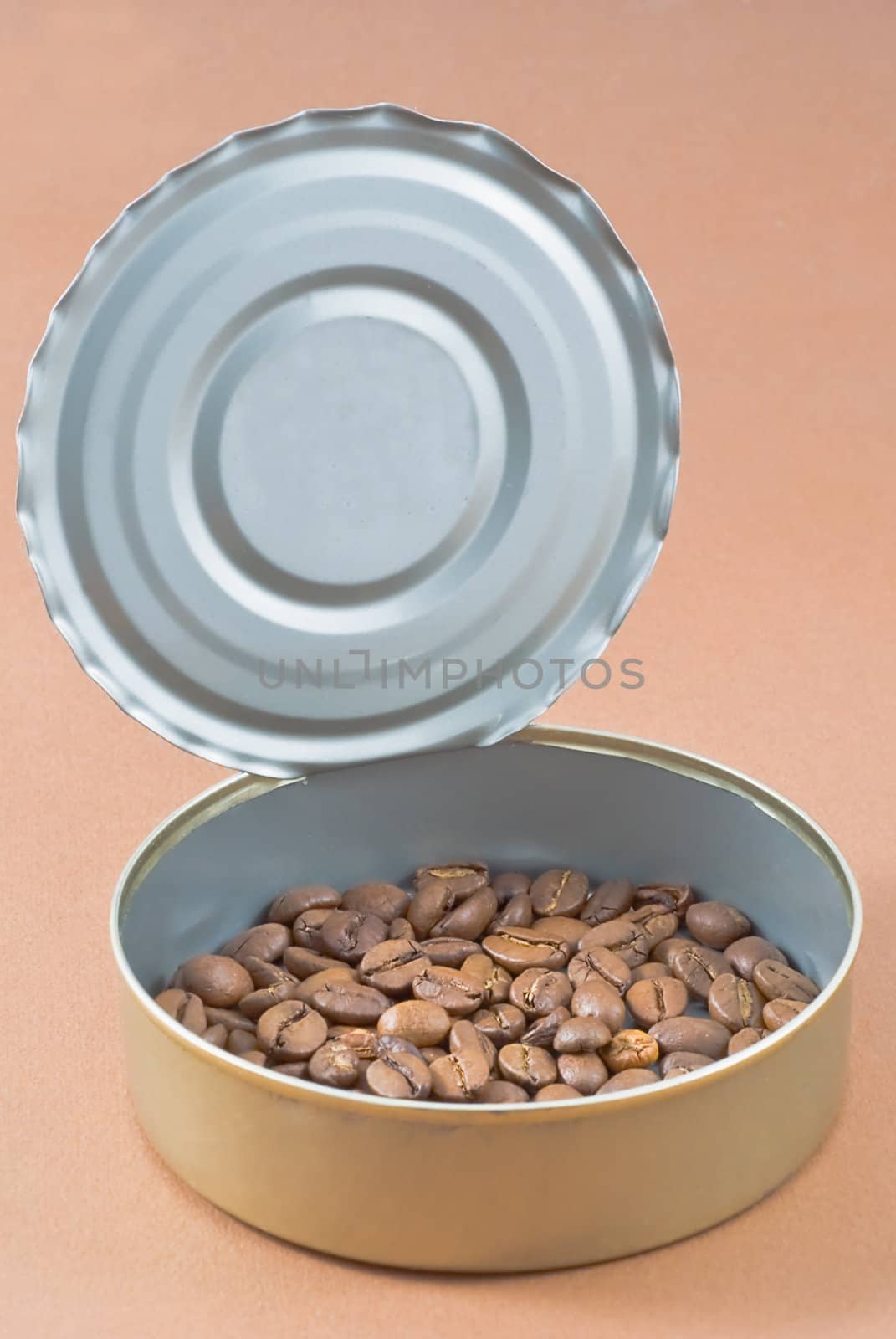 The seeds lie in a metal coffee cans