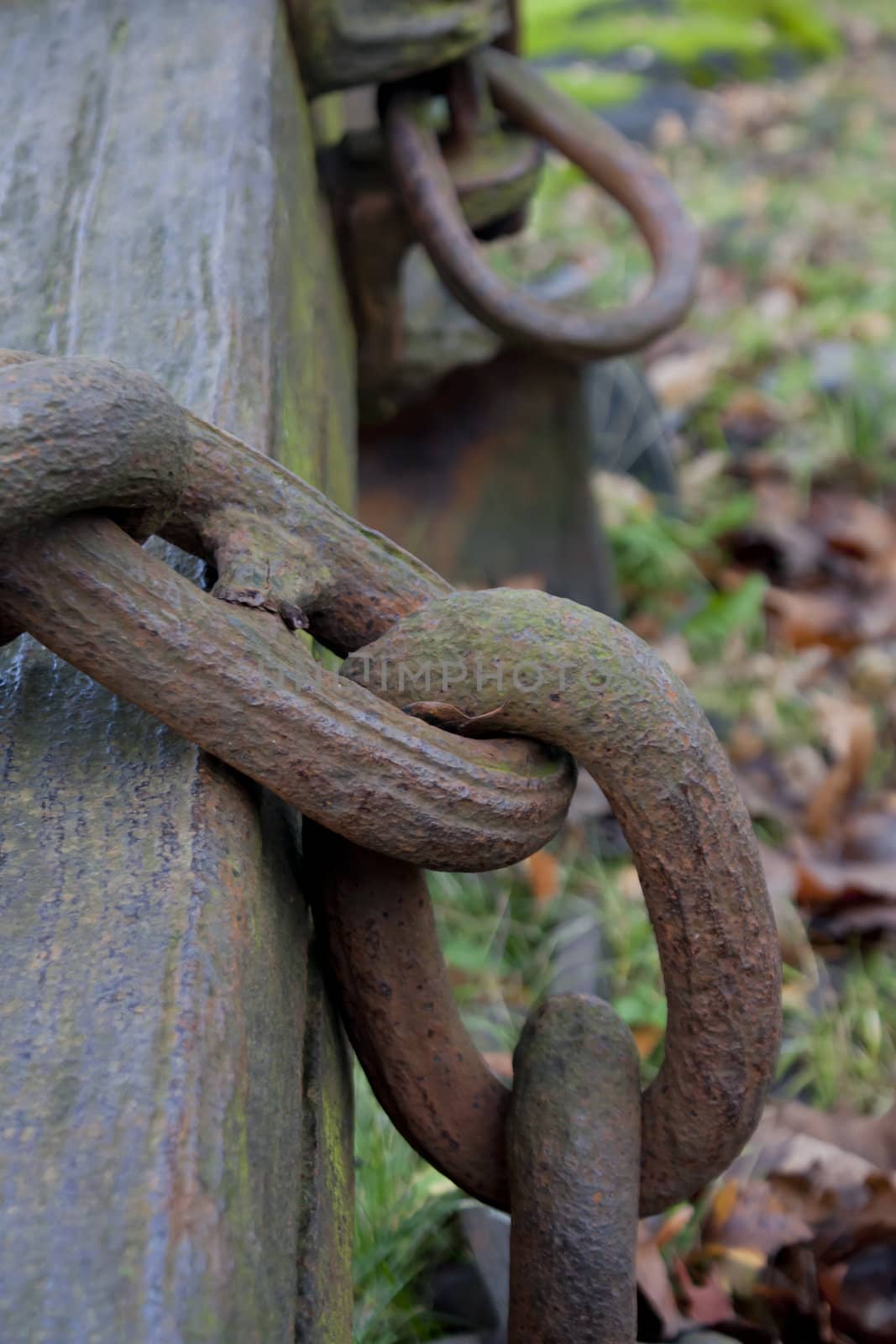 Photo of old rusted marine anchor chain.