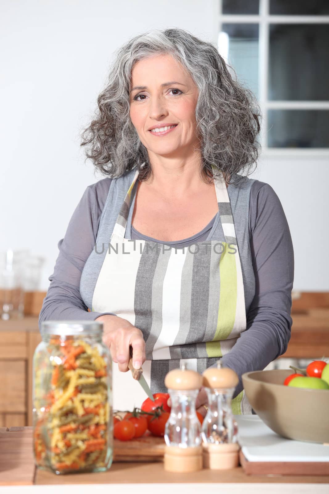 mature woman cooking