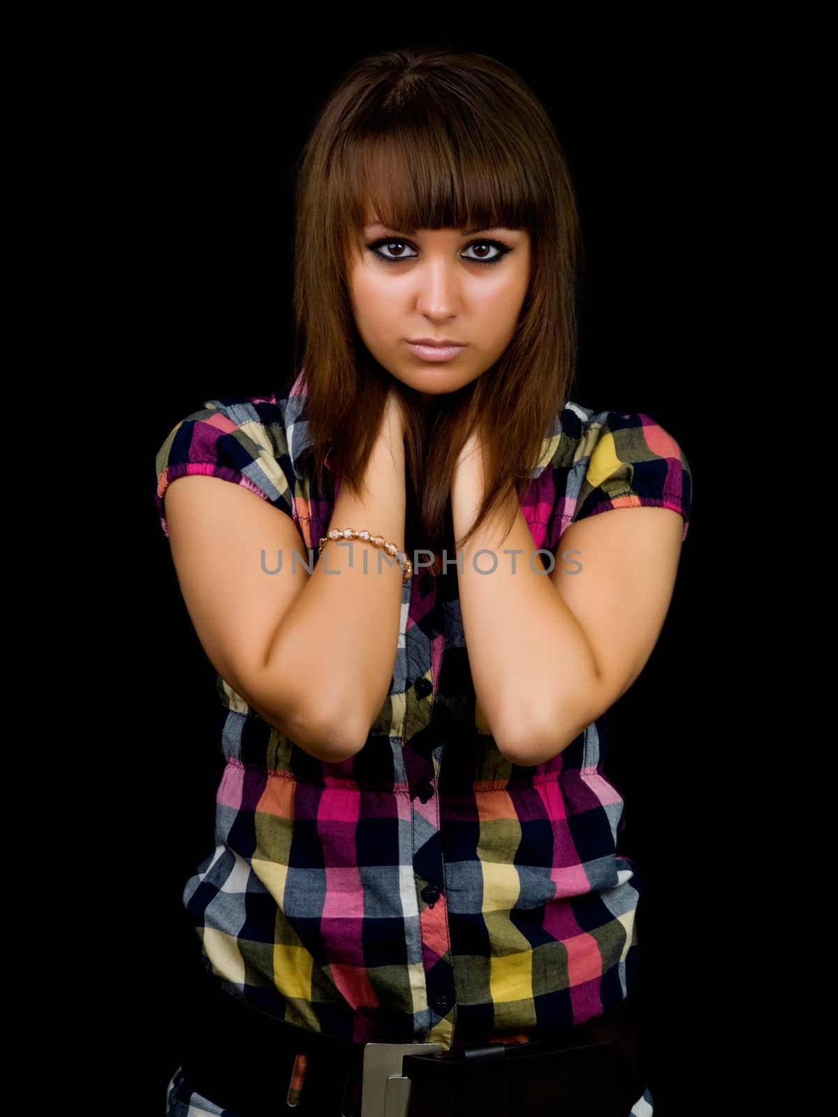 Portrait of a young girl on black background  by motorolka
