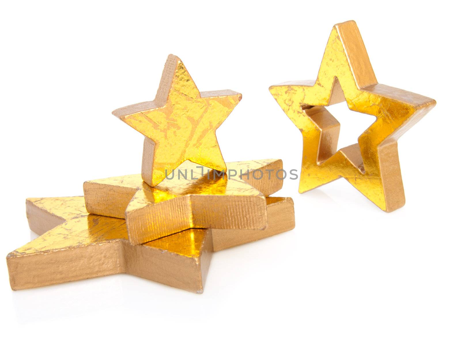 Golden Christmas stars, isolated on white background  